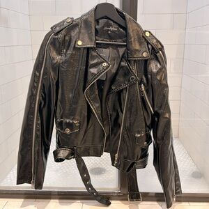 Faux Leather classic fit jacket. Its an L but fits like an M. (Runs small)